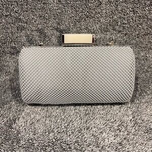 Jessica McClintock silver mesh clutch with a chain strap
